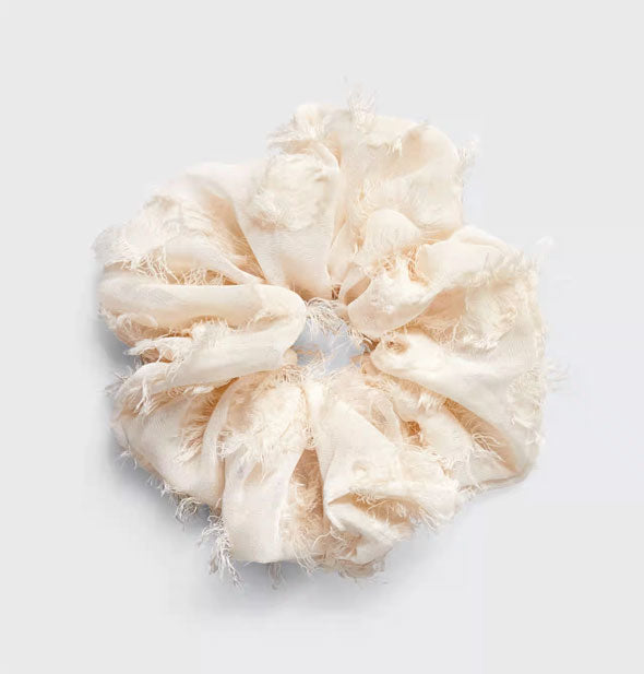 White hair scrunchie with frayed material