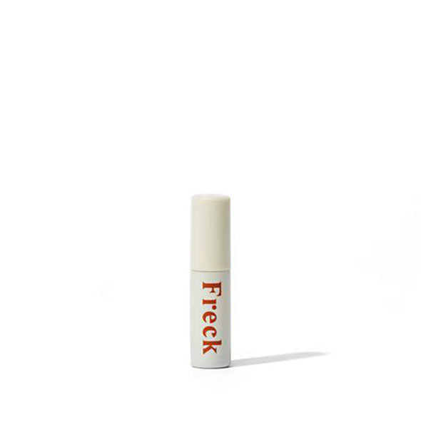 White tube of Freck cosmetic with large red lettering