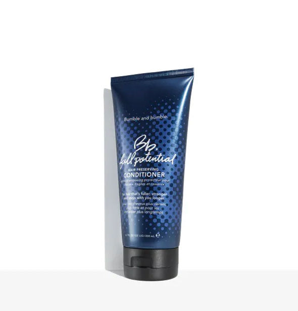 Dark blue 6.7 ounce bottle of Bumble and bumble Full Potential Conditioner
