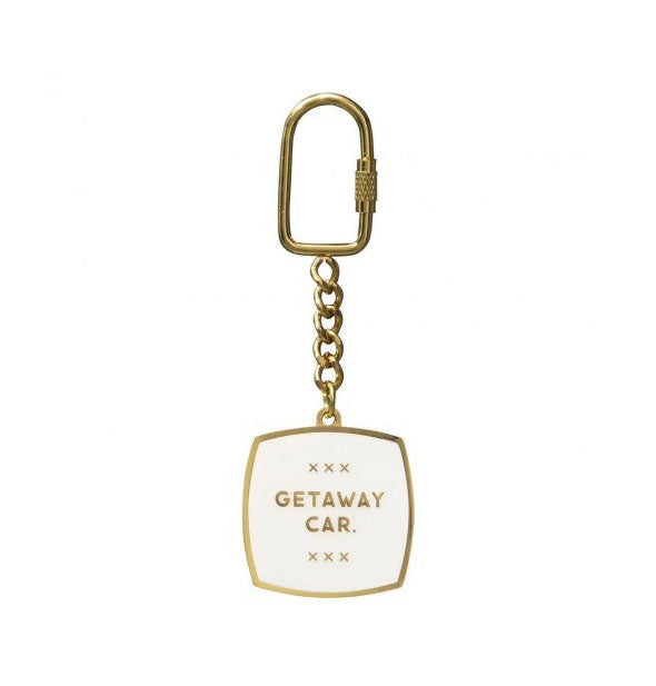 Squarish white enamel keychain tab with gold edging and hardware says, "Getaway car" with Xs above and below it in gold