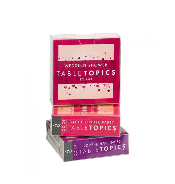 Wedding Shower, Bachelorette Party, and Love & Happiness Table Topics To Go editions stacked on top of one another