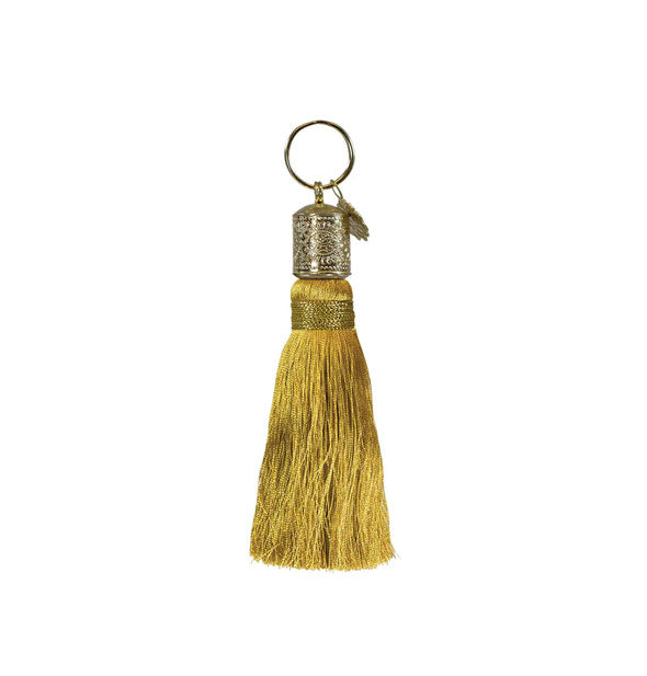 Gold tassel keychain with decorative gold hardware