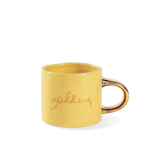 Small yellow rustic mug with gold handle says, "Dangerous" in metallic gold script lettering