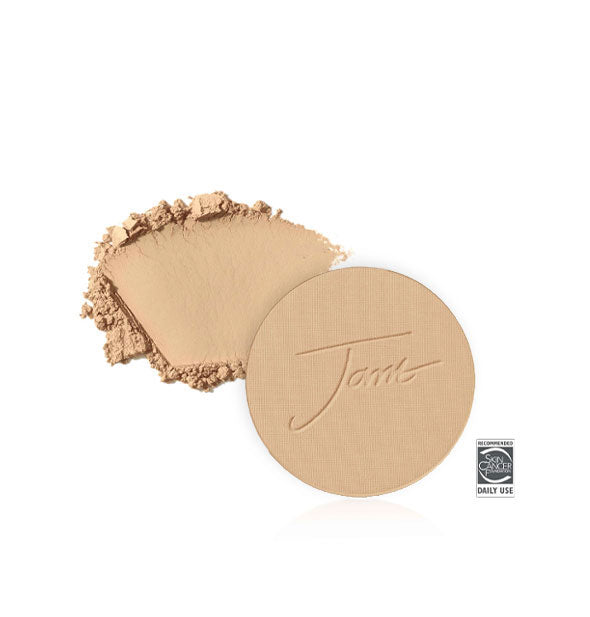 Jane Iredale PurePressed Base Mineral Foundation Refill with sample product swatch behind in the shade Golden Glow