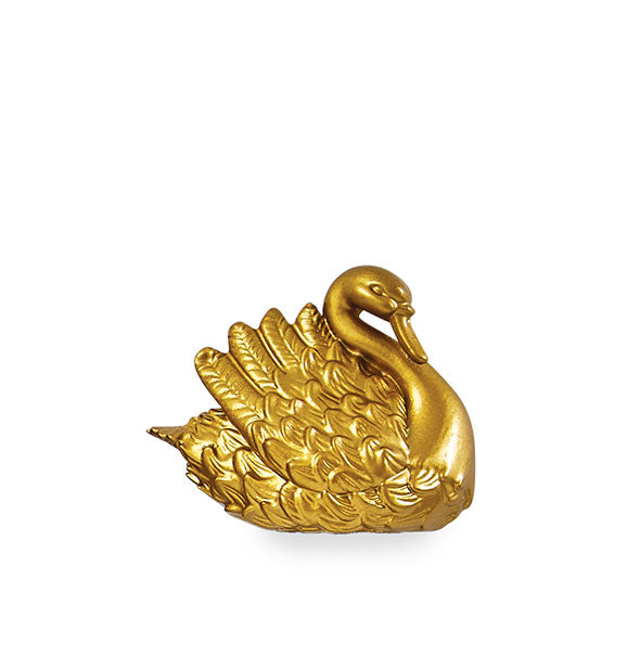 Golden swan-shaped bottle opener with ornate feather detail
