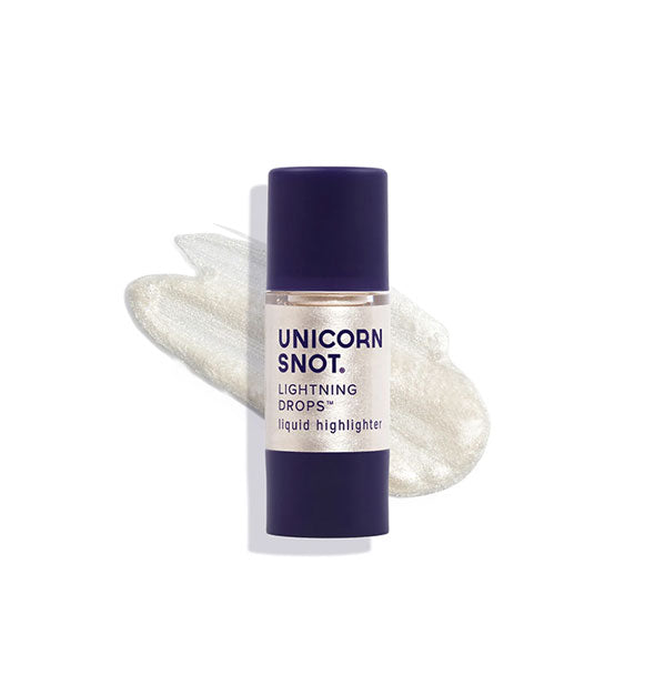 Bottle of Unicorn Snot Lightning Drops Liquid Highlighter in the shade Good Witch with sample application