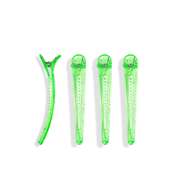Four green glitter hair clips
