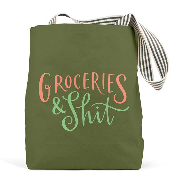 Olive green canvas bag with striped handles says, "Groceries & Shit" in pink and green lettering