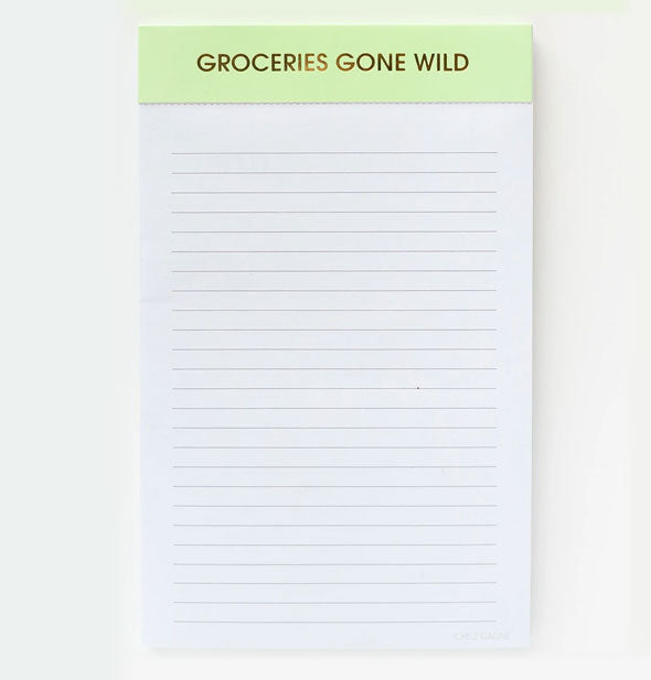 Lined note pad with green banner at top that says, "Groceries Gone Wild" in gold foil printing