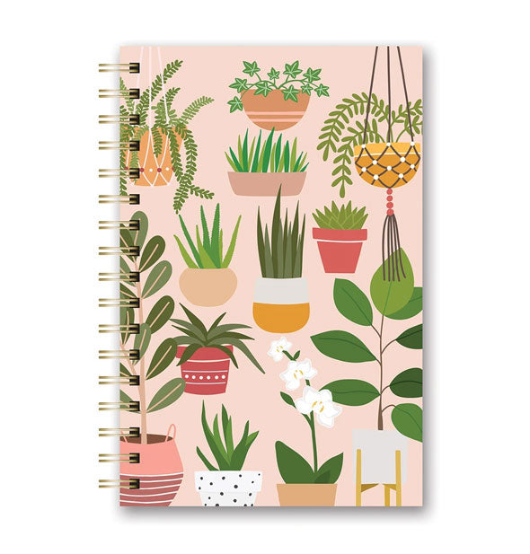 Wire-bound notebook with all-over houseplant illustrations on blush pink background