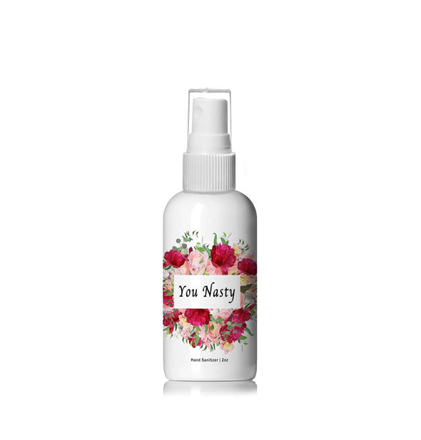 White spray bottle with pink and red floral design is printed with the words, "You Nasty"