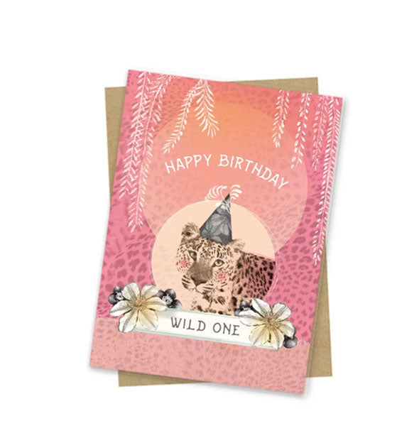 Small pink birthday card with image of a leopard wearing a party hat and flanked by white flowers says, "Happy Birthday" above and "Wild One" in a banner below
