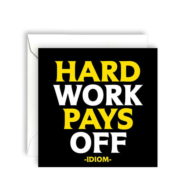 Square black greeting card with envelope is printed in large yellow and white lettering with the idiom, "Hard work pays off"