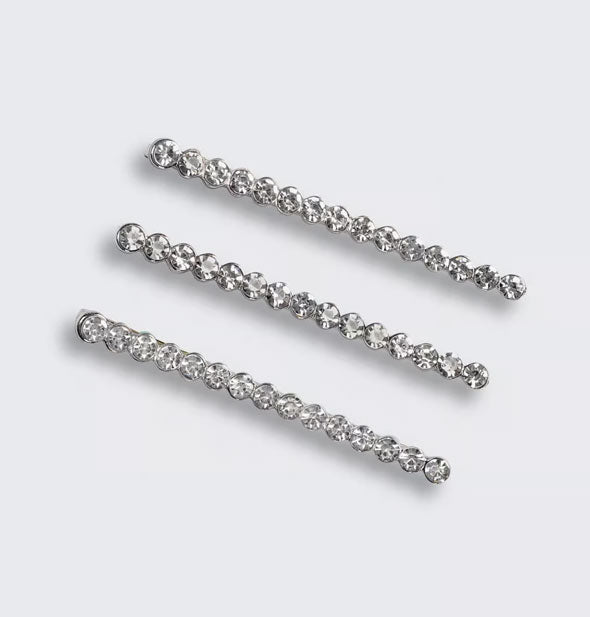 Three rhinestone-covered hair pins with a hematite tone