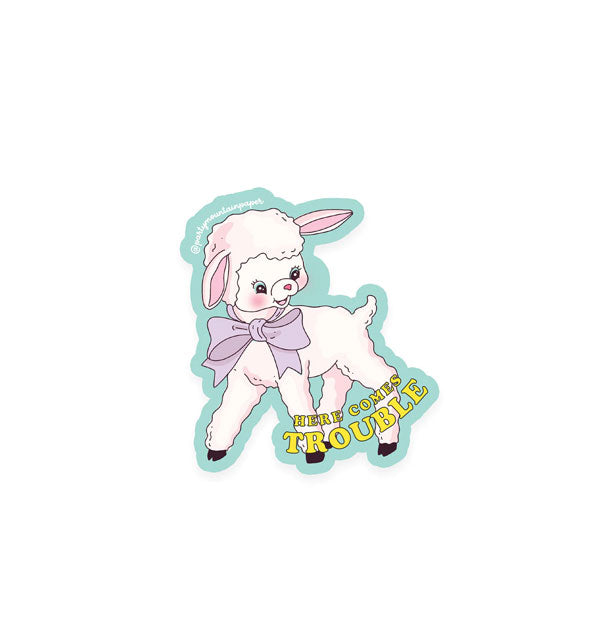 Sticker with illustration of a white lamb wearing a purple bow says, "Here comes trouble" in yellow lettering