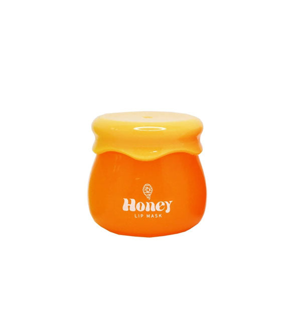 Golden pot of Honey Lip Mask with shiny rubberized yellow lid