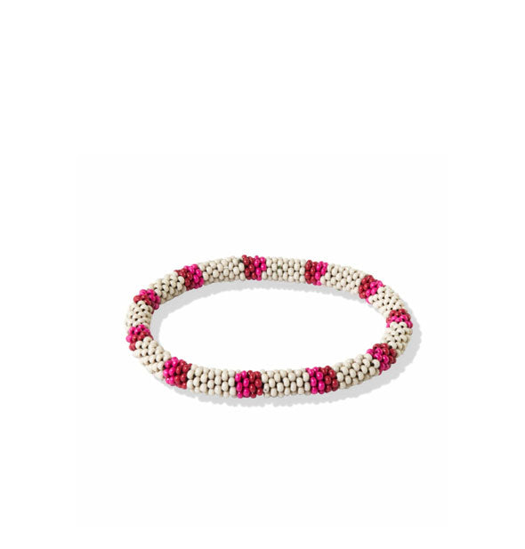 Bracelet covered with white and pink striped beadwork