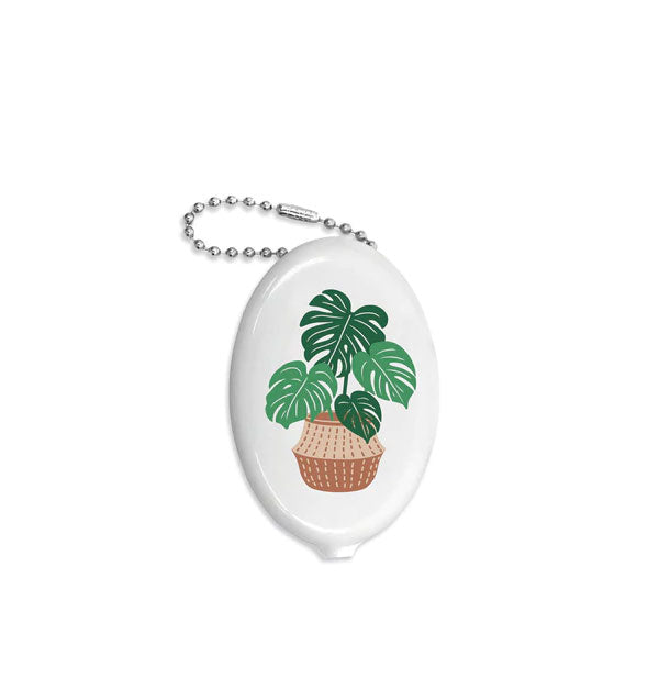 White oval coin pouch with beaded chain features illustration of a houseplant