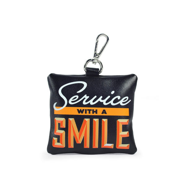 Black square leather-like pouch with silver clip attached says, "Service With a Smile" in orange and white graphic lettering