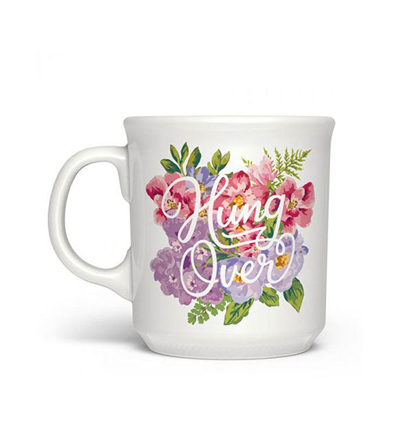 White coffee mug with colorful floral design says, "Hung Over" in white script