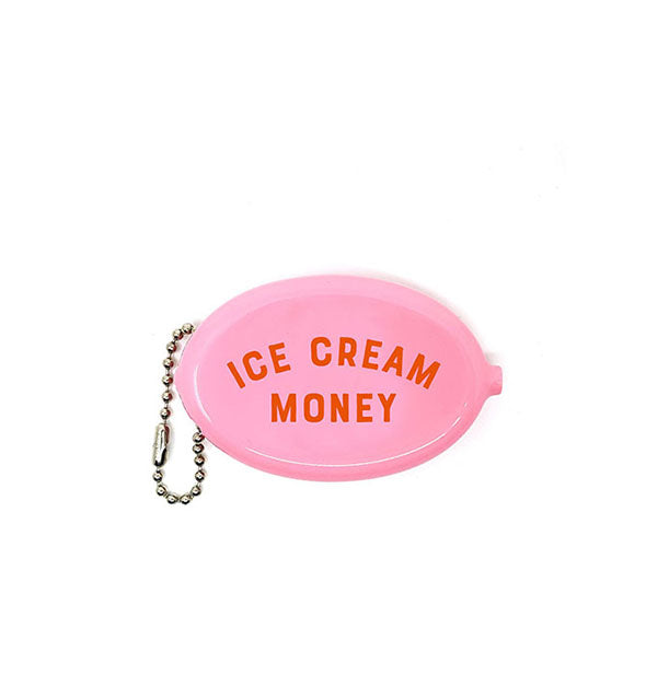 Pink oval-shaped coin pouch with attached bead chain says, "Ice Cream Money" in red lettering