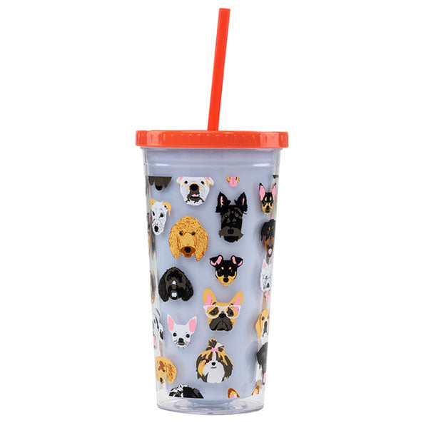 Periwinkle blue tumbler with red lid and straw features all-over dog face illustrations