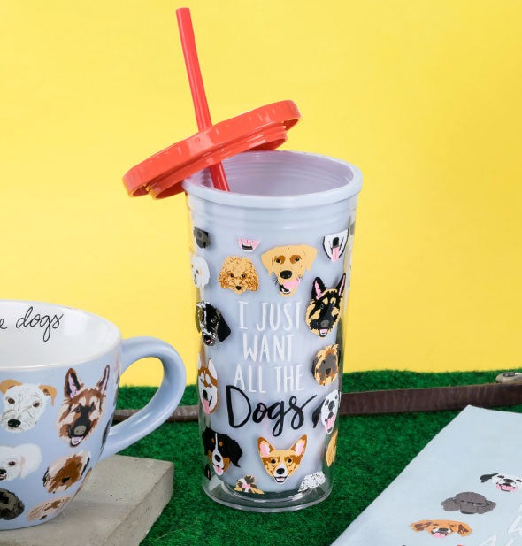 I Just Want All the Dogs tumbler with lid unscrewed and moved slightly aside