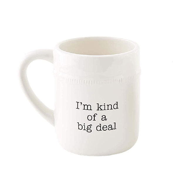 White ceramic mug with embossed detail says, "I'm kind of a big deal" in black lettering