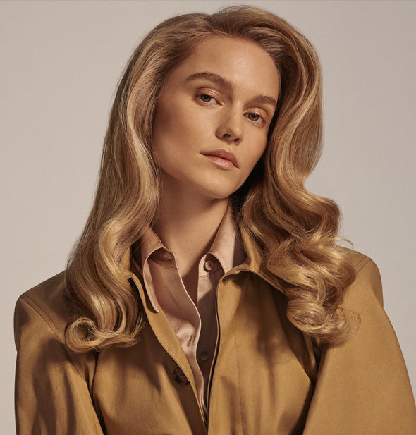 Voluminous hair styled with Oribe Imperial Blowout Transformative Styling Crème