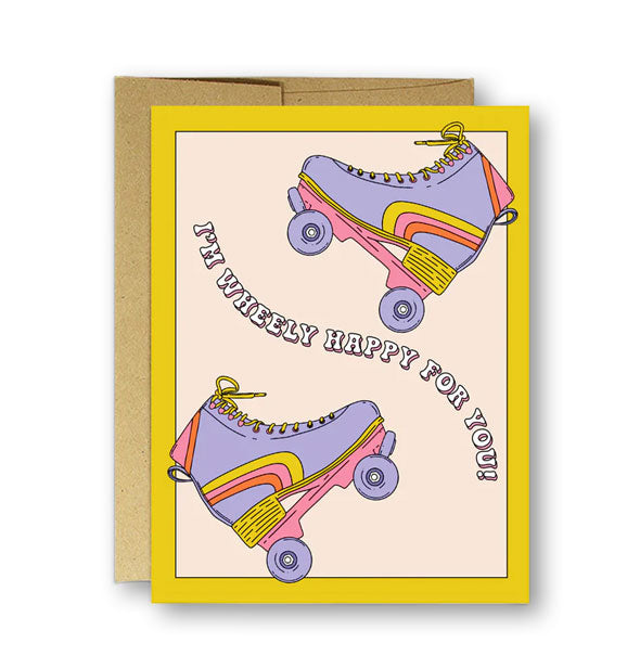 Kraft envelope and greeting card with yellow border and illustration of two purple roller skates says, "I'm wheely happy for you!"