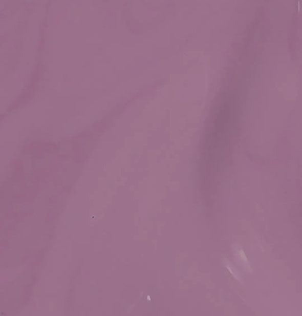 Closeup of muted purple nail polish