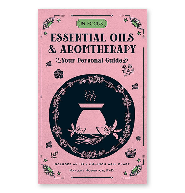 Pink cover of In Focus Essential Oils & Aromatherapy: Your Personal Guide features black lettering and design elements