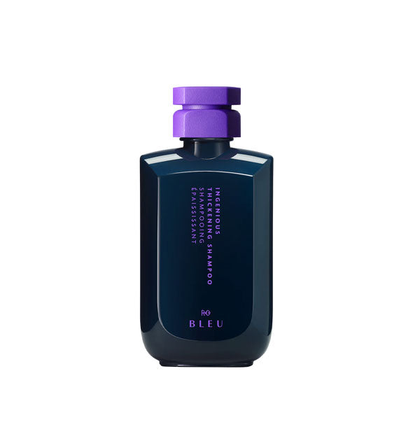 Two-tone purple bottle of R+Co Bleu Ingenious Thickening Shampoo