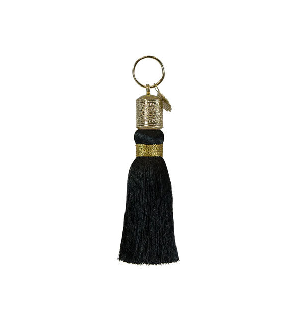 Black tassel keychain with decorative gold hardware