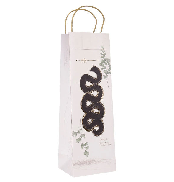 Tall, slender, white gift bag features green leaf embellishments and a thick, curvy, black line in the center