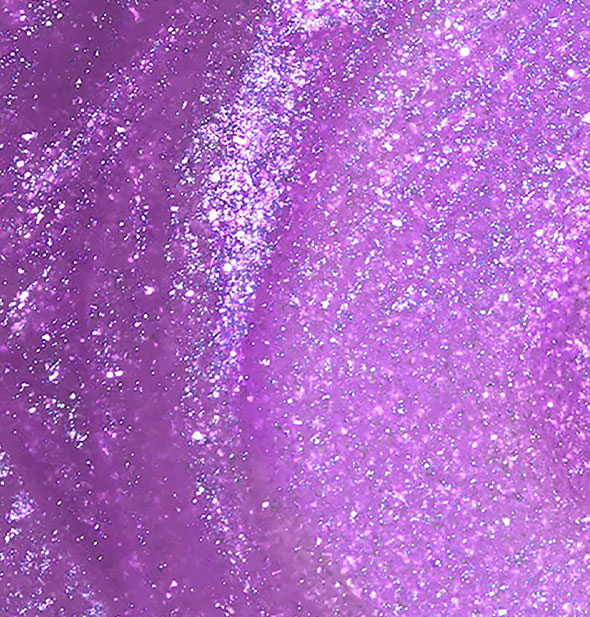Close up of shimmering purple nail polish
