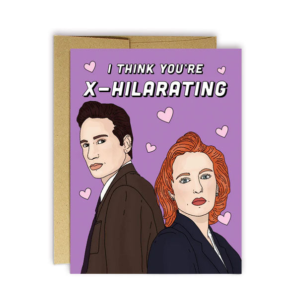 Purple greeting card with kraft envelope features illustration of Agents Mulder and Scully from The X-Files accented by hearts under the words, "I think you're X-hilarating"