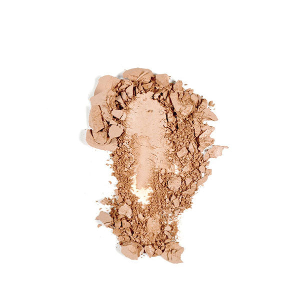Crushed makeup powder in a light tan shade