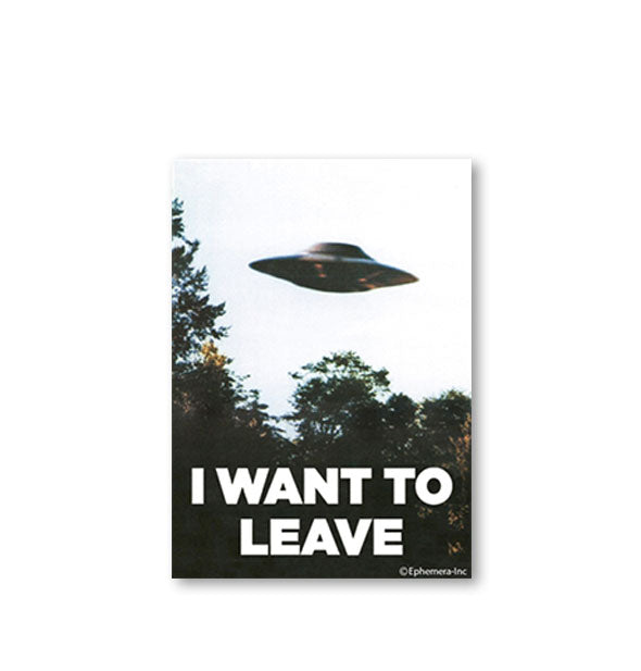 Rectangular magnet with image of a spaceship flying over trees says, "I want to leave" in white lettering at the bottom
