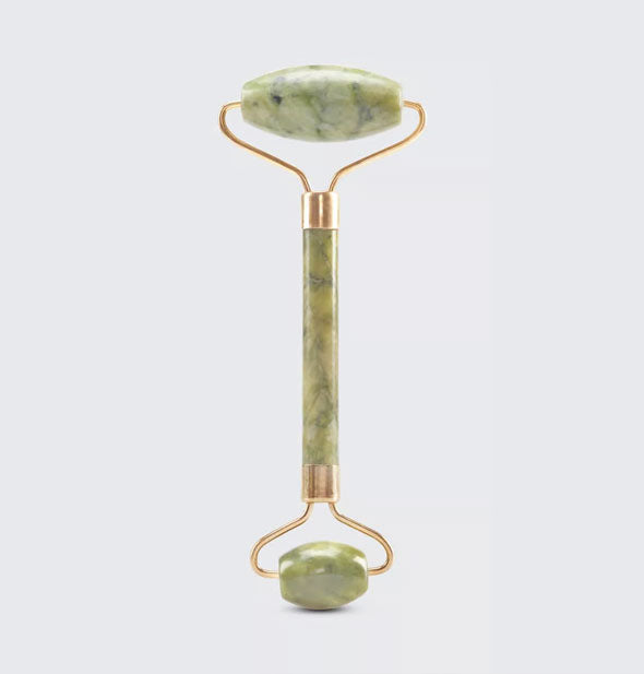 Double-ended jade facial roller with gold hardware