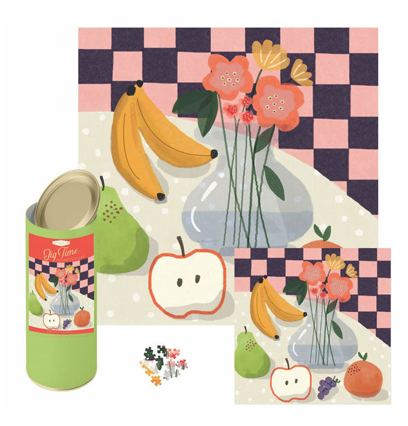 Completed Fruit & Florals Jig Time Jigsaw Puzzle shown with loose puzzle pieces and green cylindrical packaging