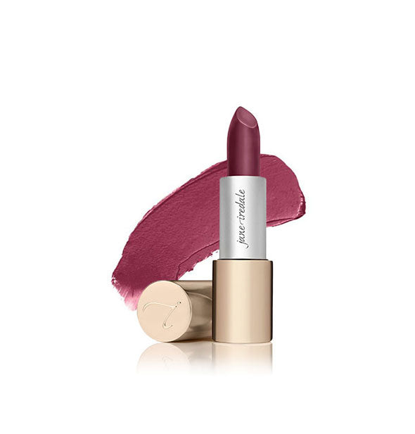 Tube of Jane Iredale lipstick with cap removed and sample swatch behind in the shade Joanna
