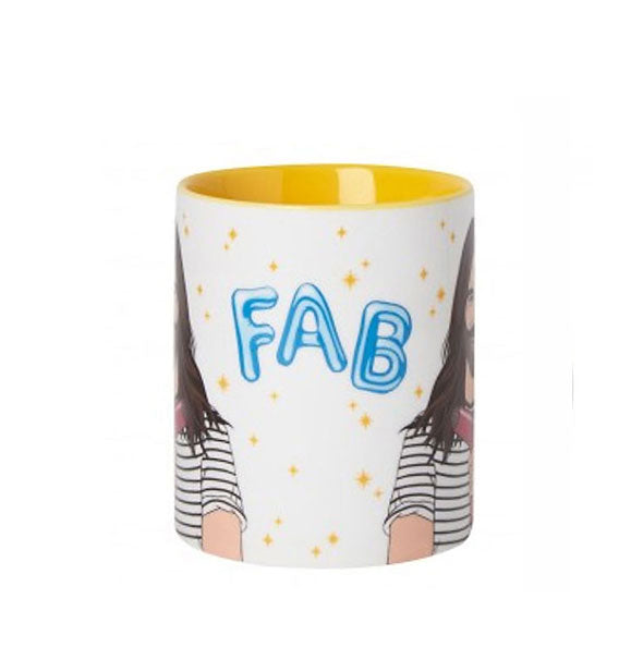Coffee mug with front and back illustrations of Jonathan Van Ness says, "FAB" in the center in blue bubble lettering amid yellow stars