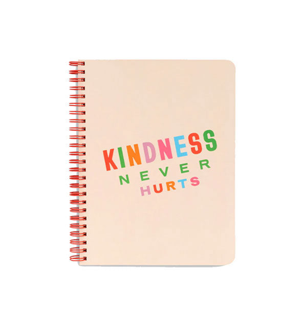 Light tan notebook cover with red spiral binding says, "Kindness never hurts" in multicolor lettering