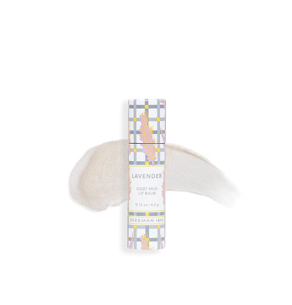 Pastel plaid tube of Beekman 1802 Lavender Goat Milk Lip Balm with sample product application behind