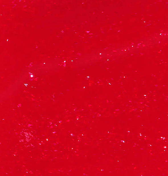 Closeup of shimmery red nail polish
