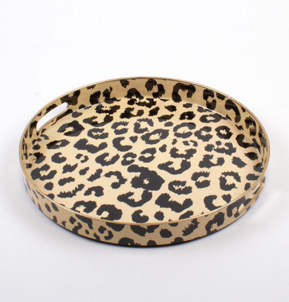 Round brown and black leopard print serving tray with handles cut into a shallow rim