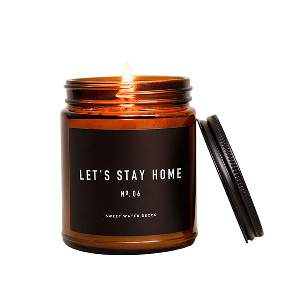 "Let's Stay Home" amber glass jar candle with black label and lid