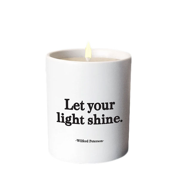 White ceramic candle with black lettering