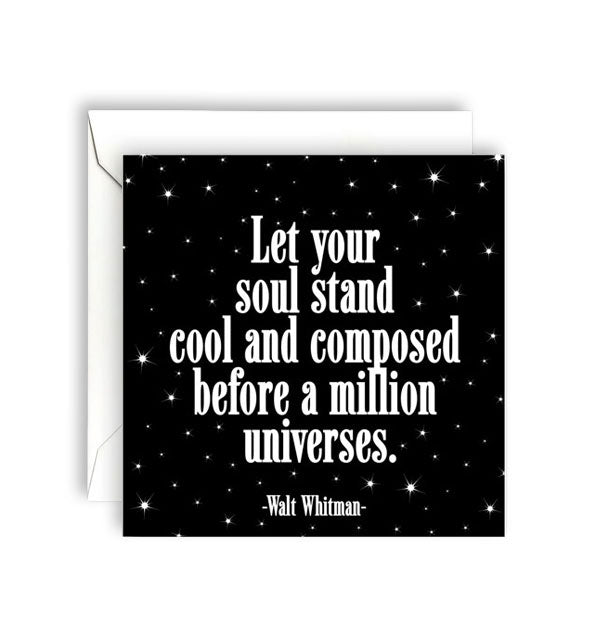 Square black greeting card with white envelope is printed with white stars and a quote by Walt Whitman: "Let your soul stand cool and composed before a million universes."
